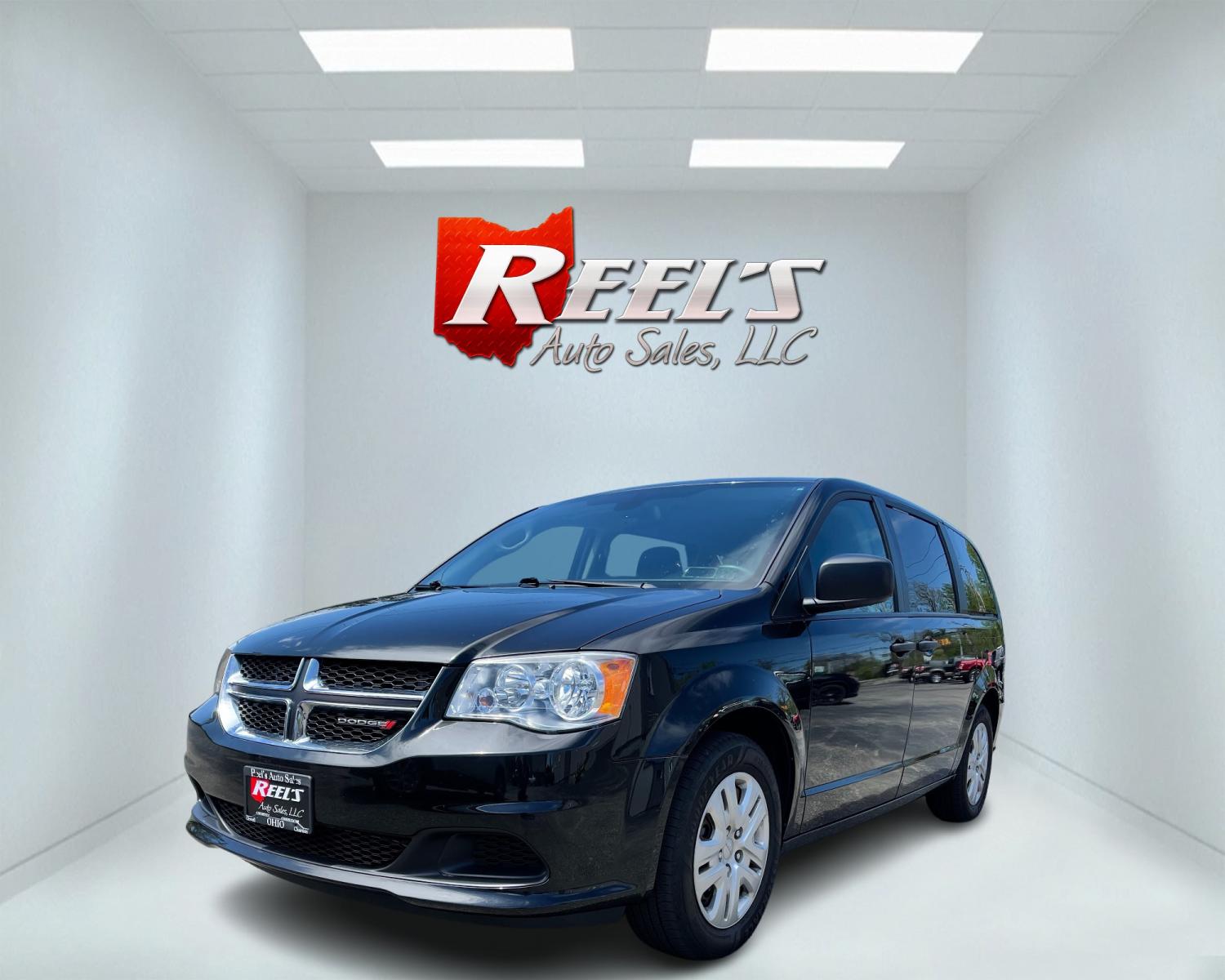 2019 Black /Black Dodge Grand Caravan SE (2C4RDGBG6KR) with an 3.6L V6 DOHC 24V engine, 6A transmission, located at 547 E. Main St., Orwell, OH, 44076, (440) 437-5893, 41.535435, -80.847855 - This 2019 Dodge Grand Caravan SE presents a practical and spacious option for families or travelers needing room for seven passengers. Powered by the robust 3.6L Pentastar V6 engine paired with a 6-speed automatic transmission, it delivers a smooth and reliable driving experience. This model boasts - Photo #0